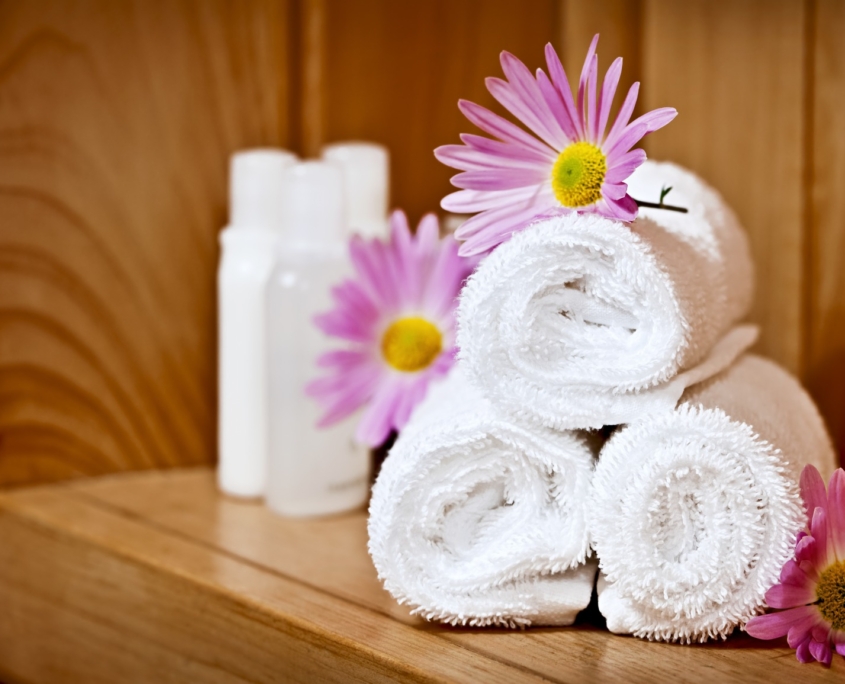 White rolled up spa towels